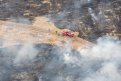 Взяли огонь в кольцо: 100 человек двое суток тушили природный пожар у Талакана