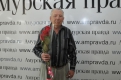 Николай Сачков привез журналистке букет красных роз.