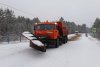 Больше 80 спецмашин и тракторов очищают дороги Приамурья от снега