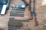 Житель Дмитриевки хранил в доме винтовку, два ружья и почти тысячу патронов