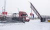 В день разрешения въезда в Хэйхэ 100 грузовиков проехали по мосту через Амур