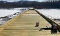 В Селемджинском районе отремонтировали поврежденный ледоходом мост. Фото: t.me/mintrans_amur