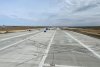 Нижний слой новой взлетной полосы в Благовещенском аэропорту готов наполовину