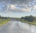 В Благовещенском округе вода подтопила въездную дорогу в село Грибское