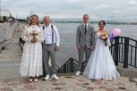 Любовь в амурском стиле: как четыре пары одновременно сказали «да» на набережной Зеи в Благовещенске