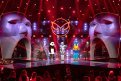 Участники шоу «Маска»: Паук, Панда, Робот и Попугай. С ведущим Вячеславом Макаровым.