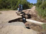В отдаленных районах Благовещенска восстанавливают размытые дождем дороги